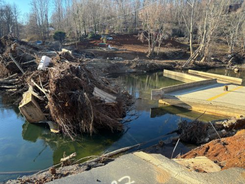 Sanford Contractors crews begin bridge reconstruction in Yancey County as part of Hurricane Helene recovery efforts.