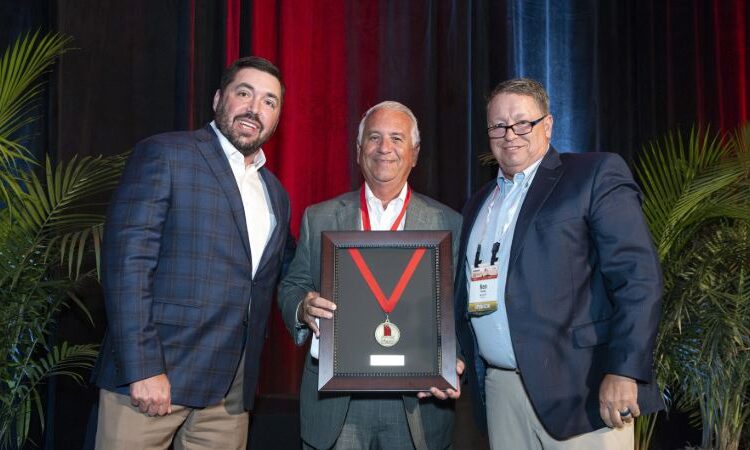 Donnie Oldham with Hall of Fame Award